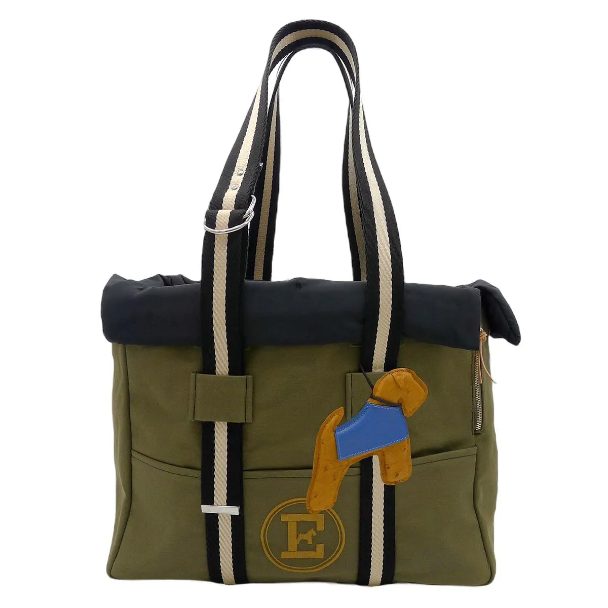 Green Bag And Black Dog Carrier